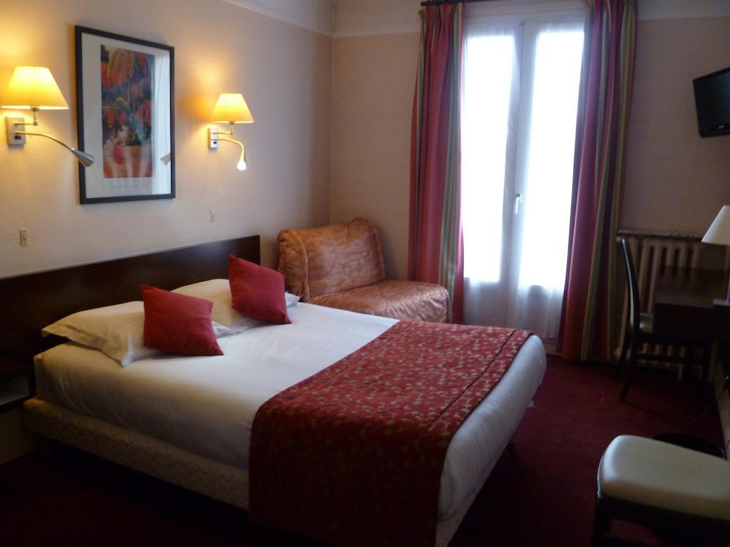 Hotel Le 37 Bis Нёйи-сюр-Сен Номер фото